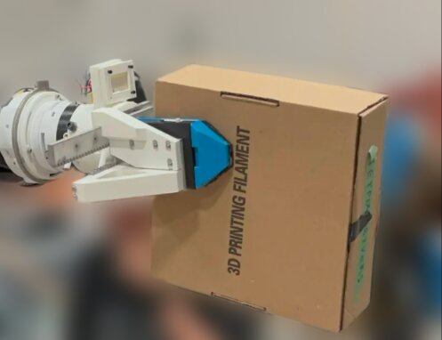 The end effector gripping a payload.